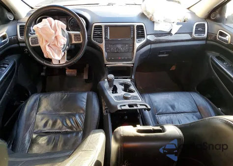 2013 Jeep Grand Cherokee Laredo z USA, uszkodzony, nr VIN 1C4RJFAT4DC571415